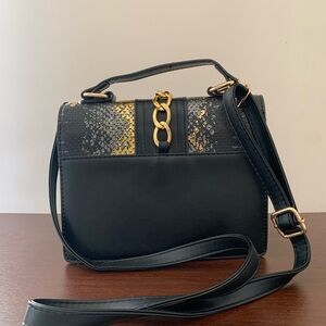 Elegant Black and Gold Handbag